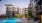 a pool in a courtyard between buildings