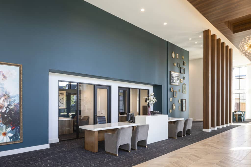 office with green teal background and desk chairs at Broadstone Emeline Heights in Houston, Texas